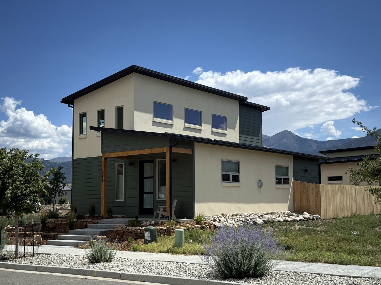 Completed photograph: Southside Modern residence in Salida viewed from the front corner with mountains beyond.
